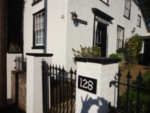 The bespoke wall compliments the listed building.