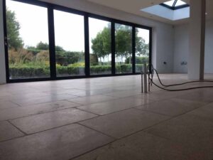 Floor tiling completed and ready for commencement of kitchen fitting.