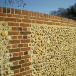 Traditional Stone Flint Walling | incorporating Flemmish Bond Brickwork with white Cement & Lime.