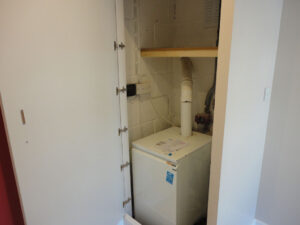 Purpose built cupboard around a boiler.