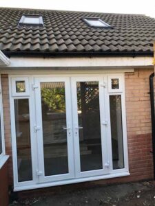 The garage link conversion with french doors, side lights and Velus roof light windows.