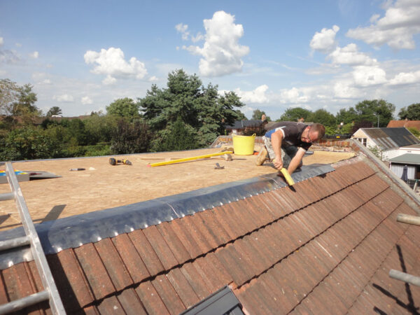 A traditional flat roofing system. (This is the ALT text field)